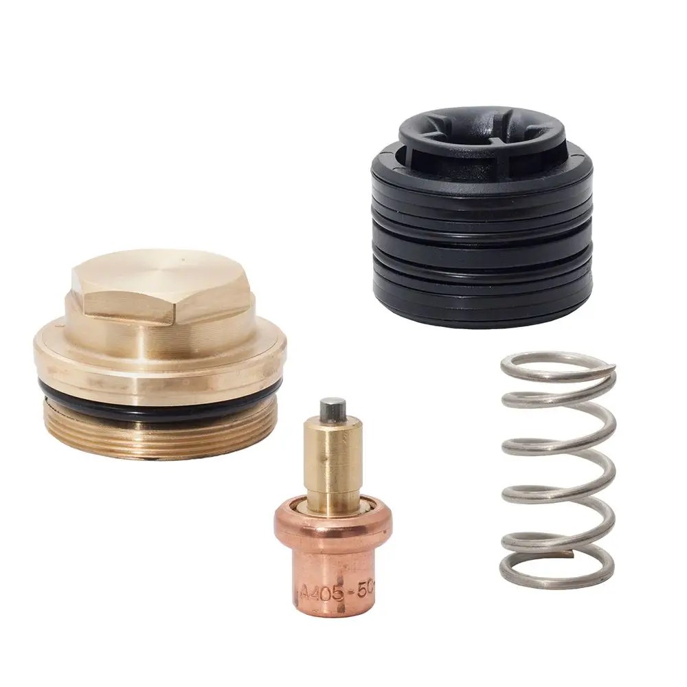 Ersatzteile für Thermostat, bestehend aus einem metallenen Gehäuseteil, einem schwarzen O-Ring, einem metallenen Ventileinsatz und einer Feder. Teile stammen von der Marke ESBE.